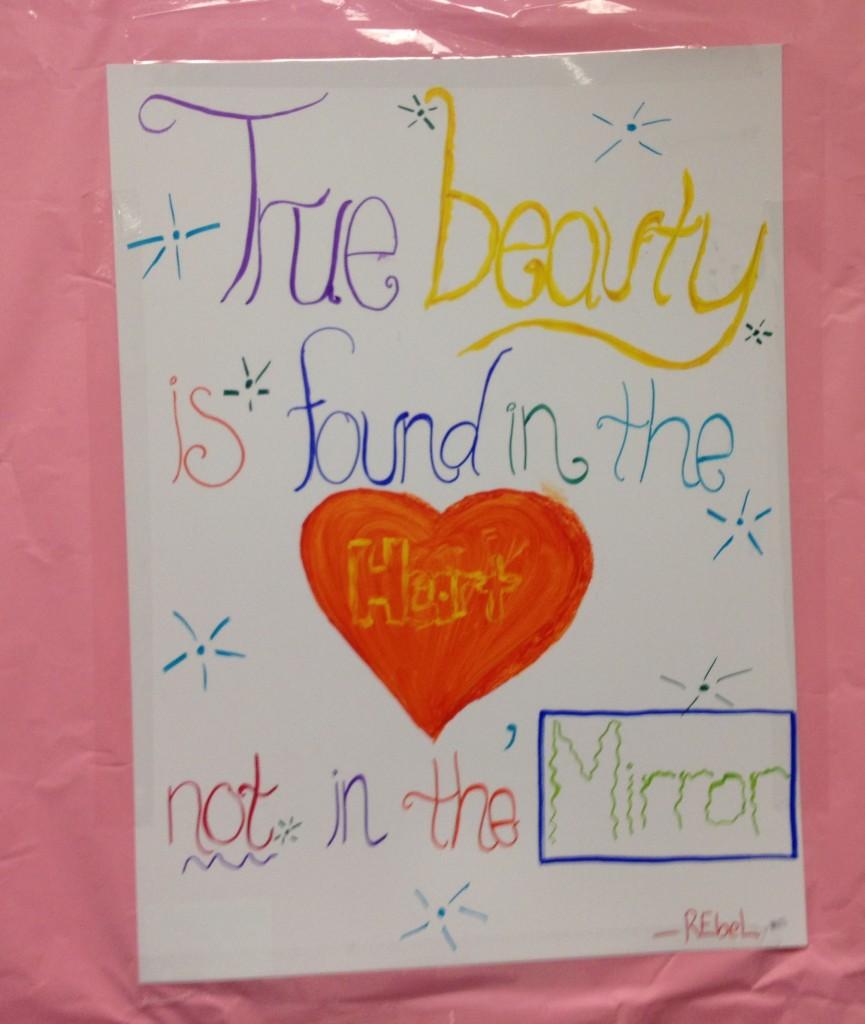 Posters were taped to bathroom walls as well as over the colored paper. These messages were created by REbel for Mirrorless Monday.
