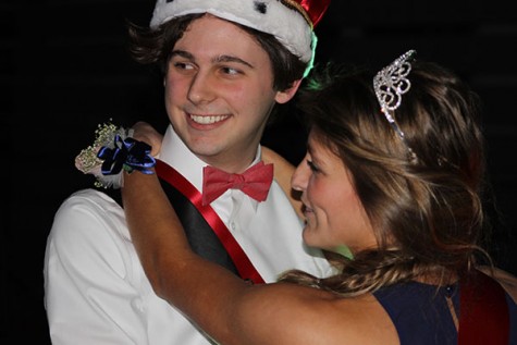 The Royal Couple. Seniors Carter Bryant and Paige Becker enjoy the traditional first dance at the Hogwarts themed Sweetheart Dance on Jan. 30.