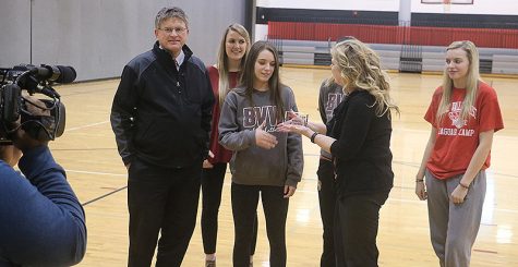 Senior Brooke Lansford is presented with the HyVee Athlete of the Week on Feb. 27.