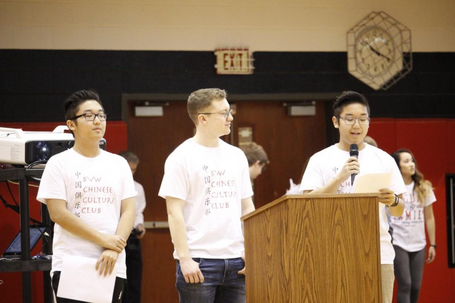 Seniors, Treaux Jackson, Yin Song, and Xiaosheng Song talking about their new club Chinese club at the Diversity Assembly January 26.