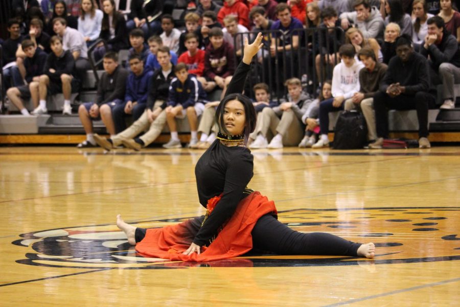 Junior, April Ma showing her flexibility off as she dances solo at the BVW Diversity Assembly January 26.
