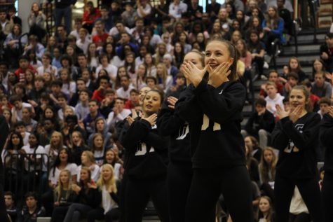 WEST SIDE. The Crimson Cats perform their routine at the assembly on 4/6.