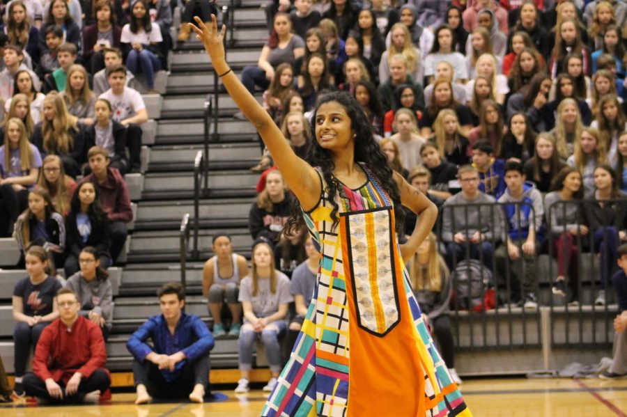 Senior, Madura L. raising the roof as she performs to a cultural song at the Diversity Assembly January 26.