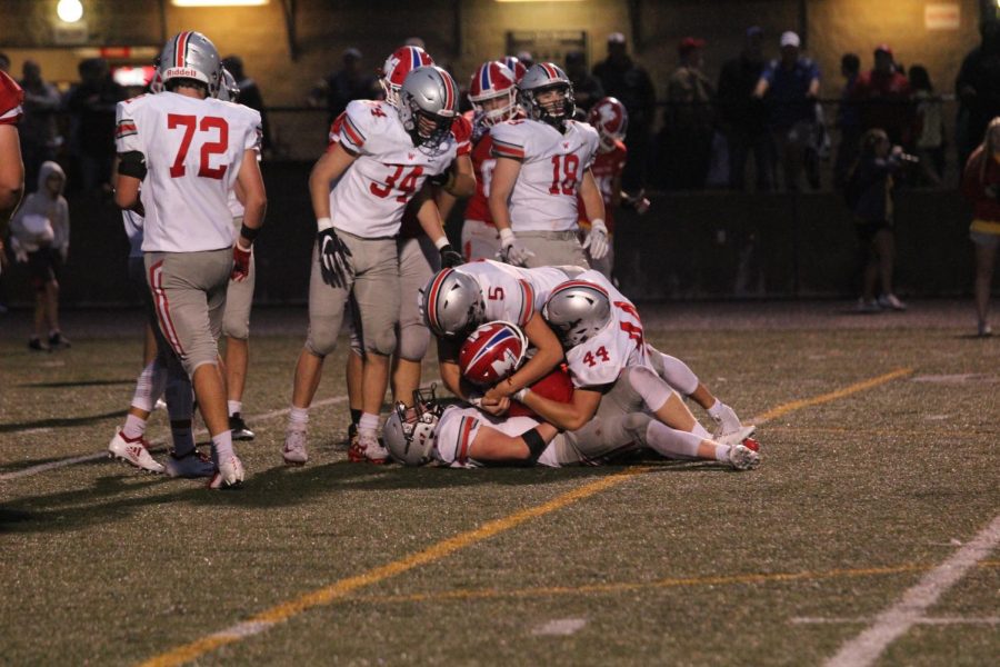 Teamwork makes the dream work. The guys all worked together to stop Miege from getting more yardage and prevent them from scoring a touchdown. They never gave up and continued to work for one another. 