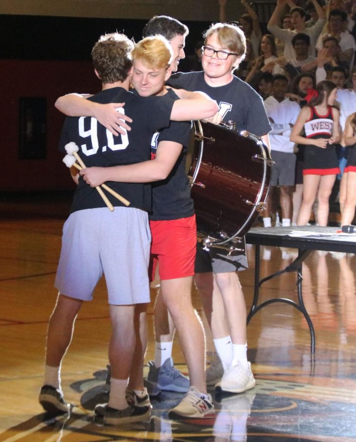 Passing down their drum and mallets for The Chant, seniors Tommy Sulentic and Jack Mahoney share some love with juniors Jackson Shaeffer and Will Hudler. The seniors brought The Chant to games and assemblies after seeing it used by fans of the Icelandic World Cup team. I just love those guys, Schaeffer said. Theyre Jaguars.