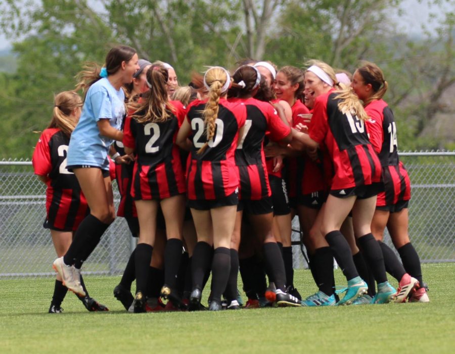 Starters, substitutes and managers of the girls soccer team celebrate Andree Orcutts winning goal on May 22. #bvwfamily