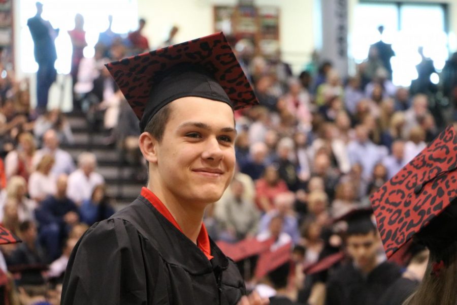 Senior Cade Sumner couldnt help but smile as they entered the gym for Class Day.