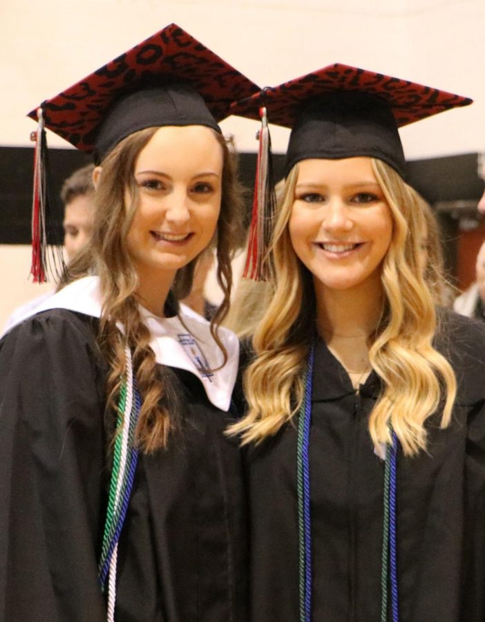 Hannah Behrman and Lauren Lillis pose for a photo after Class Day.