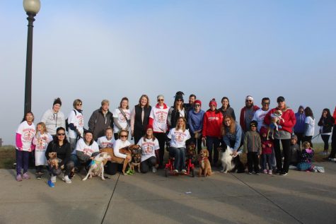 A portion of the staff who attended Moxies Mission: 6-Legged Relay Fun Run gathered for a photo on Oct. 20 at the Bar K Dog Bar in Kansas City, Mo.