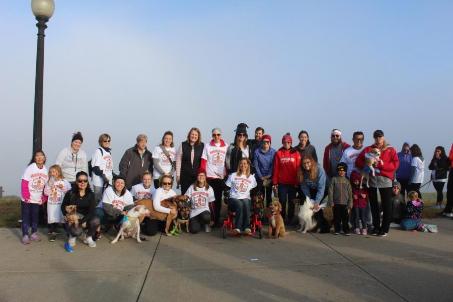 A portion of the staff who attended Moxies Mission: 6-Legged Relay Fun Run gathered for a photo on Oct. 20 at the Bar K Dog Bar in Kansas City, Mo.