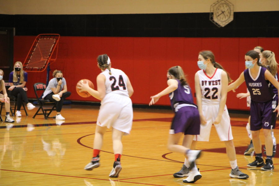 On January 1st Abby Hearron takes on the Huskies by playing pointguard. 