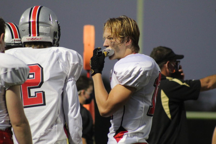 Sage Huffman shows up to his football game with a sparkly mouthpiece to add style.