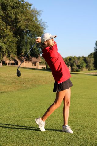 At the Deer Creek Tournament, Junior Claire Ducharme taking a swing on September 22