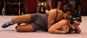 Senior Mustafaa Chapuk pinning his opponent down in his second match of the night. 