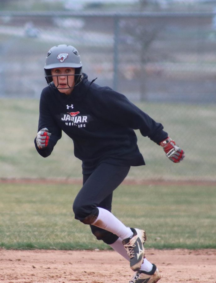 Senior Kaitlyn Walters charges towards second base. 