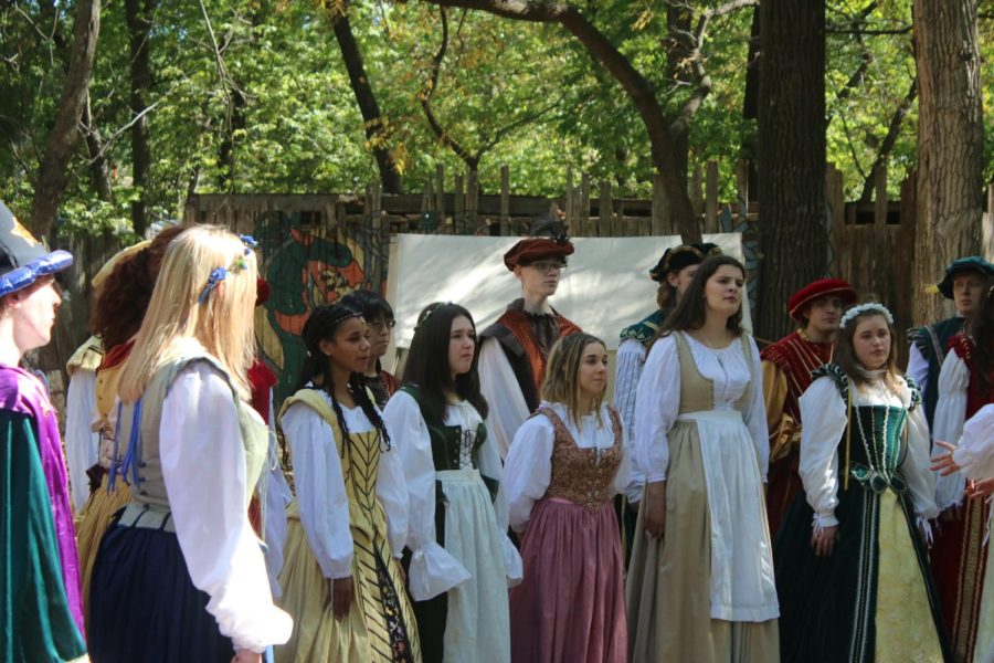 The chamber singers performing their second song at the renaissance festival