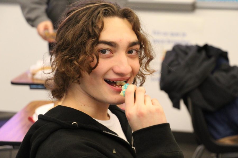 What a taste! Junior Sam Pro enjoys a christmas sugar cookie in Cookies and Friends club.