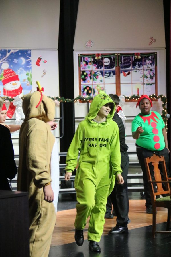 The freshmen performing their number of Youre A Mean One, Mr. Grinch.