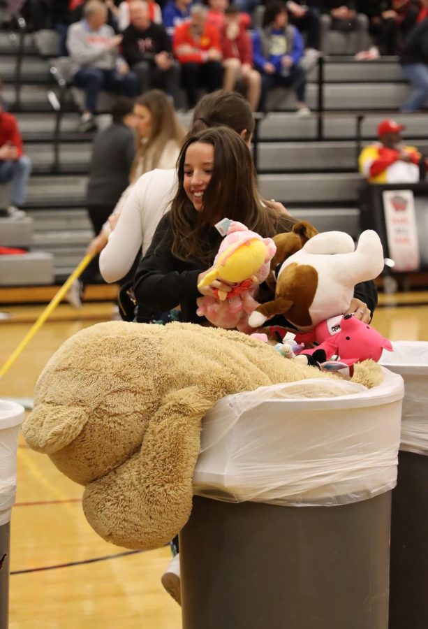 Senior Ashley Reecht flashes a bright smile while collecting donated stuffed animals.