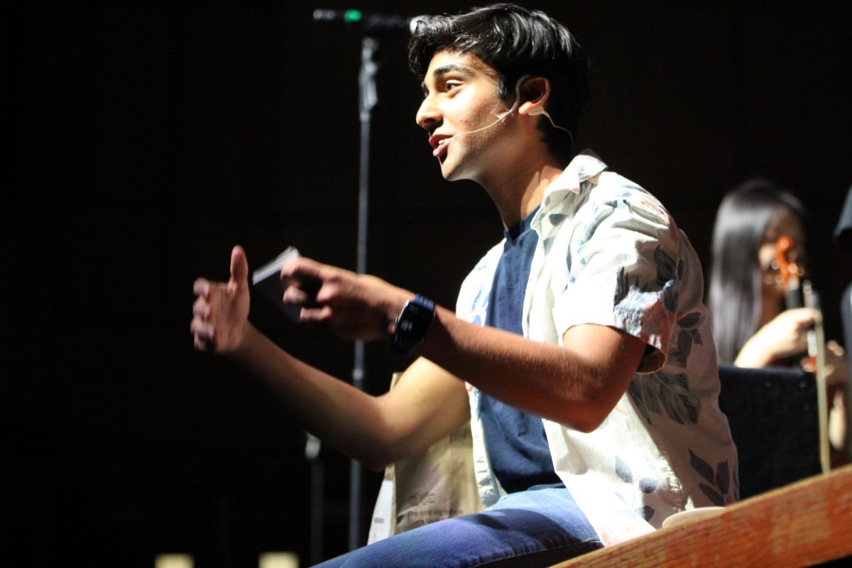 Junior Rishabh Barve MCs the Choir and Orchestra Showcase