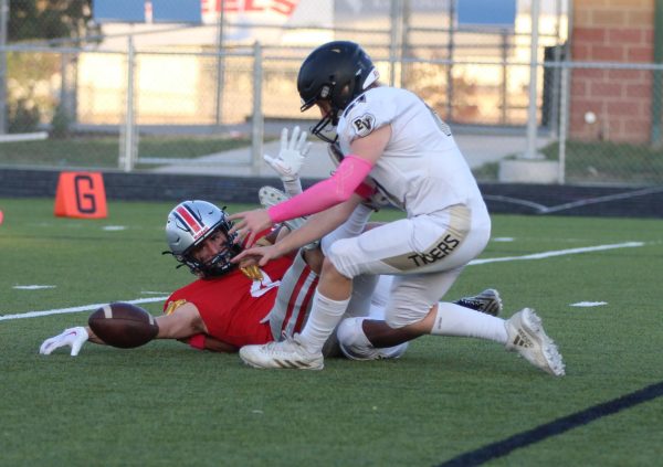 Freshman Peyton West Dropped the ball after being tackled by a Blue Valley player. 