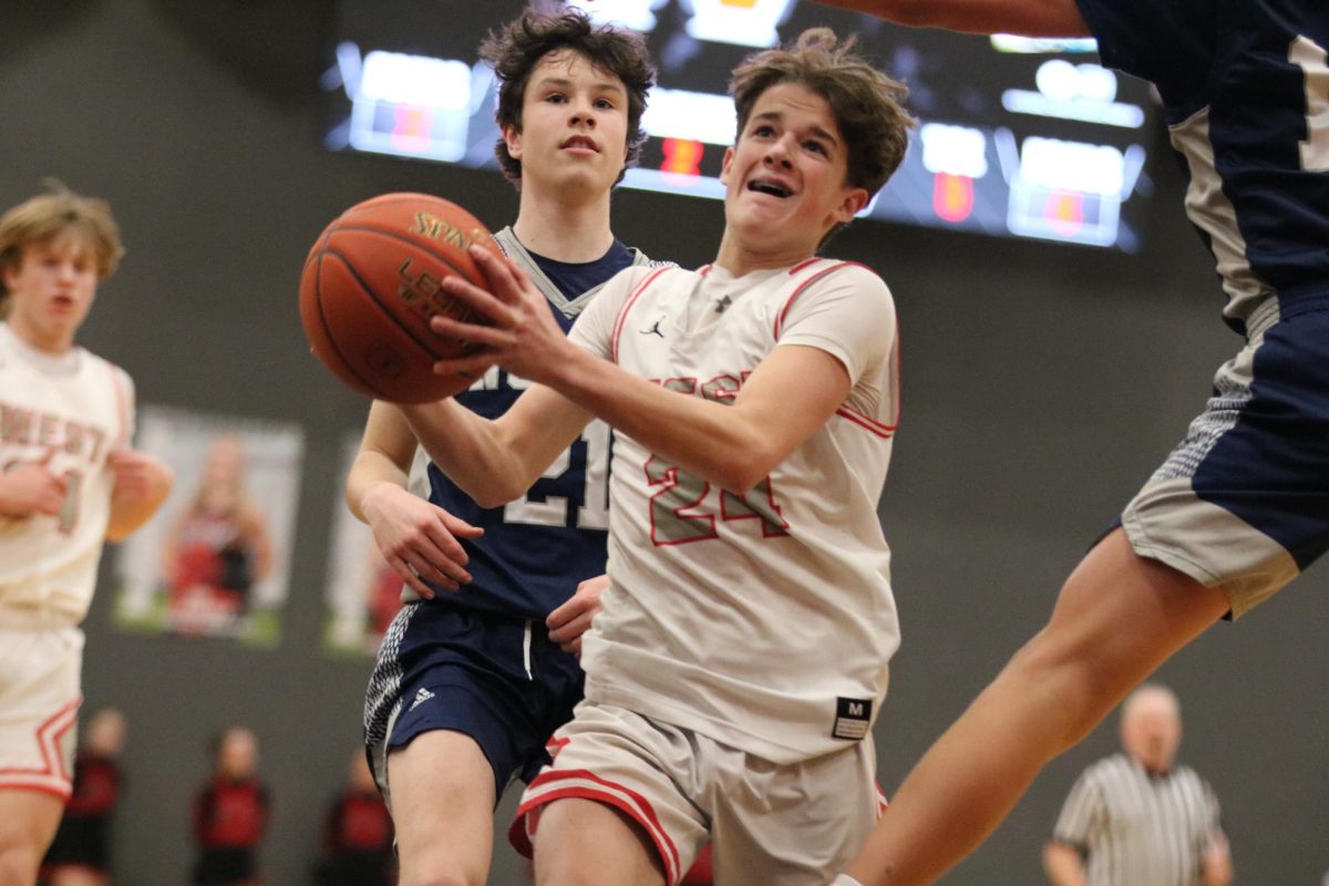 Freshman Jaxon Nagy goes for a layup. 