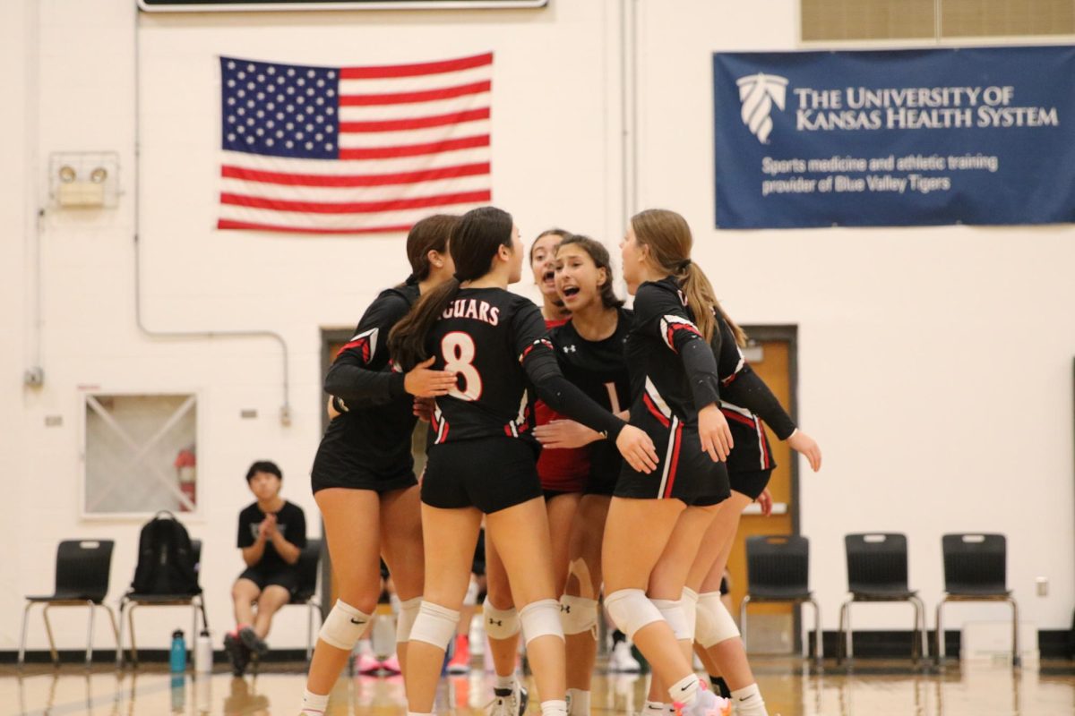 The Jags celebrate winning a set.