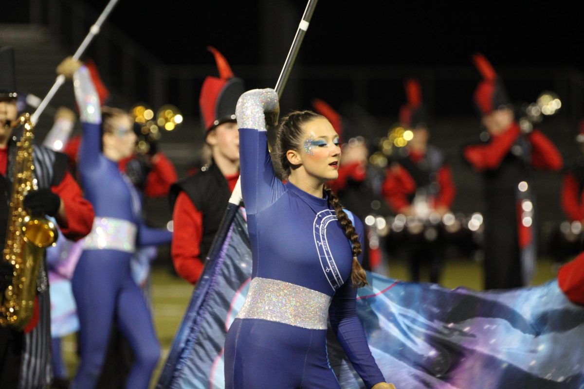 Member of BV West Color Guard performing with the band,