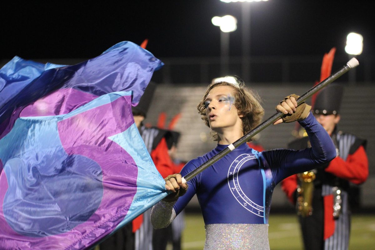 Senior Carson Turner does a flag move called a cone