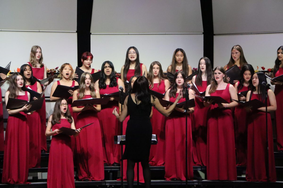 BV West choir director, Mrs. Modelski, directing the BVW choraliers.