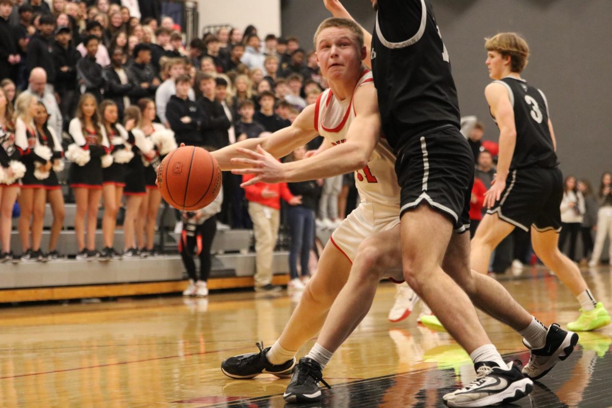 Senior Tate Miller drives to the basket